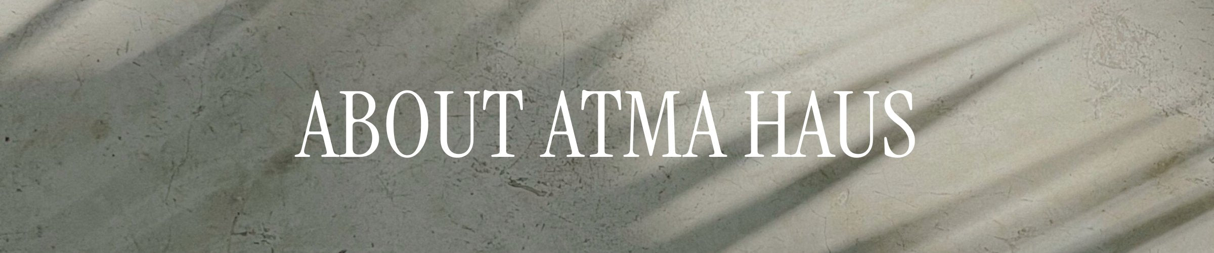 About Atma Haus designs banner with sunlit textured background, luxury girls trip travel planning brand header