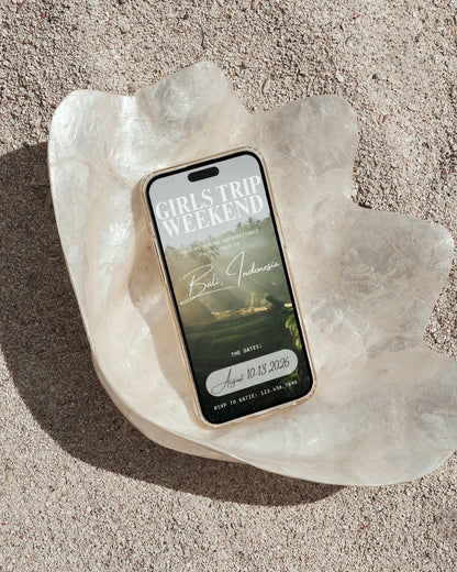 Bali Indonesia girls trip itinerary template mockup on phone in seashell on tropical beach, digital invitation, luxury canva travel planner